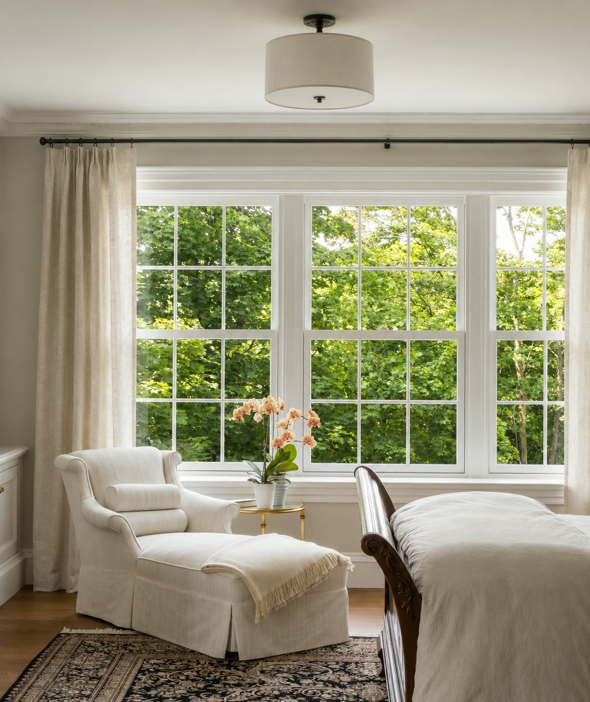Close-up of a black casement replacement window on a DFW residence