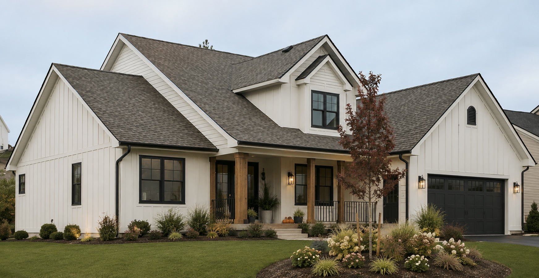 Modern Dallas–Fort Worth luxury home featuring premium black-framed replacement windows at golden hour